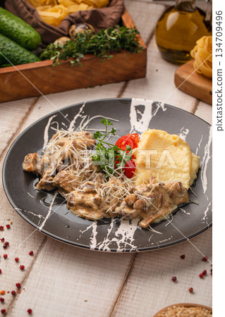 Classic beef stroganoff with mashed potatoes Classic beef stroganoff with mashed potatoes 134709496