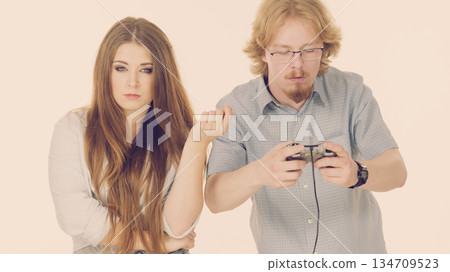 Woman is angry at playing man Woman is angry at playing man 134709523