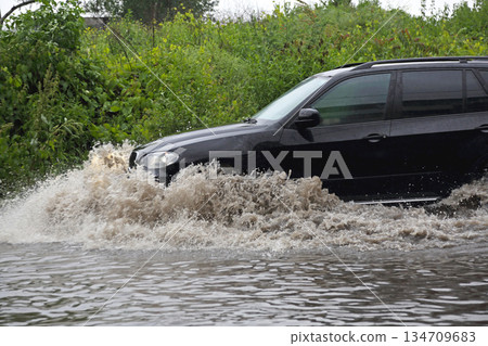 SUV Driving Fast Floods SUV Driving Fast Floods 134709683