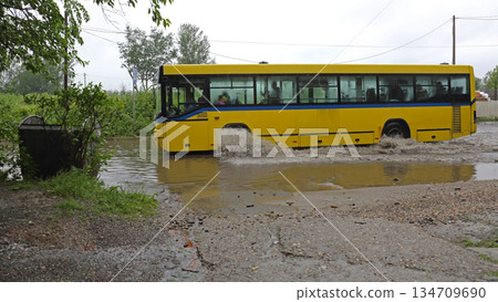Yellow Bus Floods Water Yellow Bus Floods Water 134709690