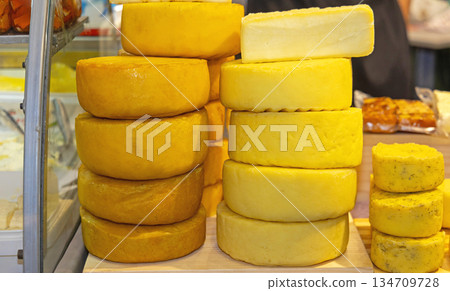 Stack of Cheese Wheels Stack of Cheese Wheels 134709728