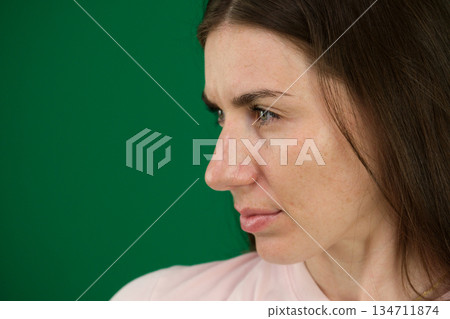 beauty, rhinoplasty and old people concept - profile of senior woman over white background 134711874