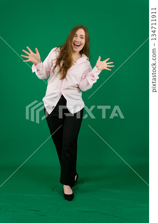 Cheerful happy woman, portrait of young caucasian 20s brunette cheerful happy woman blushing from happiness and joy, lean head on hands looking camera joyful isolated over background. Cheerful happy woman, portrait of young caucasian 20s brunette cheerful happy woman blushing from happiness and joy, lean head on hands looking camera joyful isolated over background. 134711911