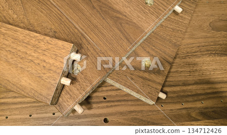 Wooden panels for assembling furniture by hand. Home repair and interior updates. High quality photo Wooden panels for assembling furniture by hand. Home repair and interior updates. High quality photo 134712426