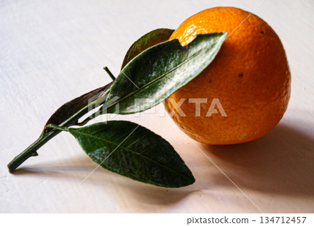 Ripe New Year's tangerine with leaves 134712457