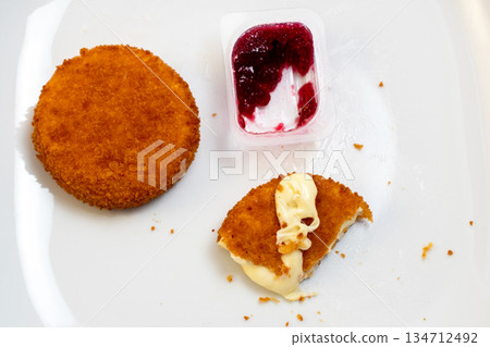 Crispy Fried Camembert Cheese with Cranberry Sauce  134712492