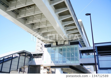 The glass facade and elevated tracks of Minumadai Shinsui Koen Station The glass facade and elevated tracks of Minumadai Shinsui Koen Station 134712589
