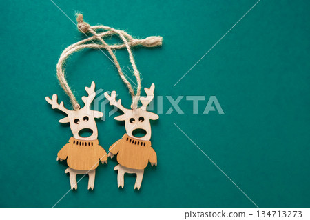 Reindeer Christmas decoration isolated on a green background 134713273