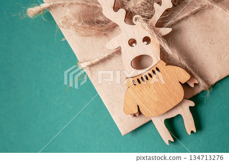 Christmas deers. Christmas decoration over green background 134713276