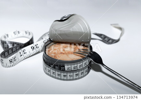 Weight loss nutrition concept with canned tuna meal Weight loss nutrition concept with canned tuna meal 134713974