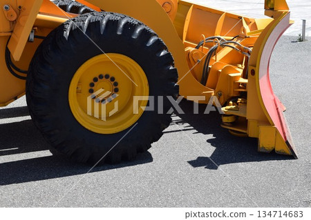 Snowplow waiting in a snowy country Snowplow waiting in a snowy country 134714683