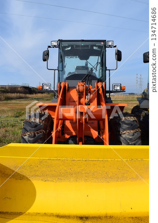 Snowplow waiting in a snowy country Snowplow waiting in a snowy country 134714686