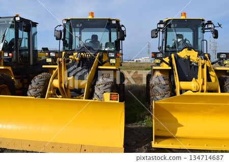 Snowplow waiting in a snowy country 134714687