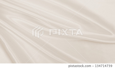 Smooth elegant golden silk or satin luxury cloth texture as wedding background. Luxurious background design. In Sepia toned. Retro style Smooth elegant golden silk or satin luxury cloth texture as wedding background. Luxurious background design. In Sepia toned. Retro style 134714739