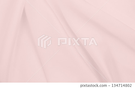 Smooth elegant pink silk or satin texture as wedding background. Luxurious background design Smooth elegant pink silk or satin texture as wedding background. Luxurious background design 134714802
