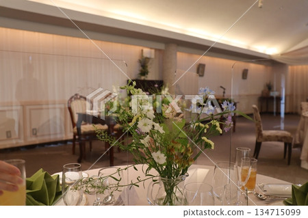 The venue, with its gorgeous round table decorations and acrylic panels, blends safety and beauty. The venue, with its gorgeous round table decorations and acrylic panels, blends safety and beauty. 134715099