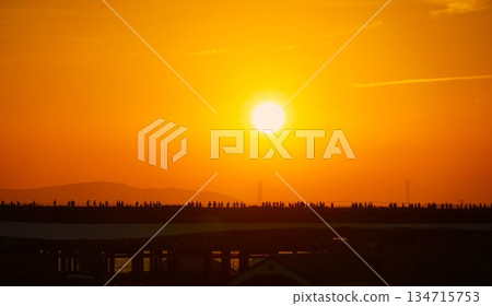 The large roof ring and the crimson sunset The large roof ring and the crimson sunset 134715753