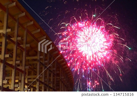 Scenery of red fireworks and the large roof ring Scenery of red fireworks and the large roof ring 134715816