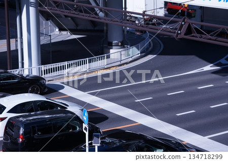 Cars waiting at traffic lights 134718299