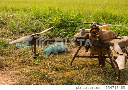 An agriculture drone preparing for take-off for agriculture work. It can accurately map the field, providing elevation data that enables producers to identify any field abnormalities. An agriculture drone preparing for take-off for agriculture work. It can accurately map the field, providing elevation data that enables producers to identify any field abnormalities. 134718465