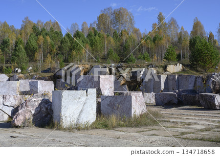 Huge cubic and geometric stone shapes in abandoned marble quarry near village of Peteni in Siberia Huge cubic and geometric stone shapes in abandoned marble quarry near village of Peteni in Siberia 134718658