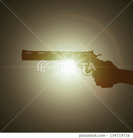 Human hand holding a revolver handgun against a bright light flare background. Concept of gun violence 134719716