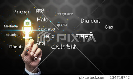 Businessman touching an artificial intelligence language translation. Glowing AI logo inside a virtual microphone surrounded by several languages. Concept of Real time AI translation Businessman touching an artificial intelligence language translation. Glowing AI logo inside a virtual microphone surrounded by several languages. Concept of Real time AI translation 134719742