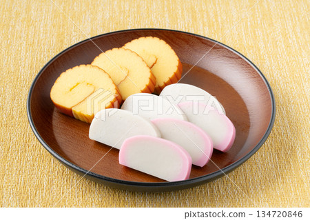 Beautifully presented datemaki and red and white kamaboko Beautifully presented datemaki and red and white kamaboko 134720846