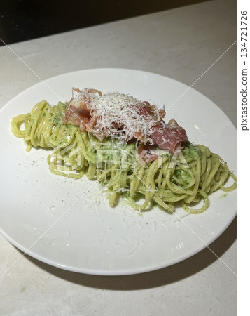 Creamy and rich spaghetti coated in a luscious white sauce, offering a smooth and savory flavor perfect for a comforting and satisfying meal. Creamy and rich spaghetti coated in a luscious white sauce, offering a smooth and savory flavor perfect for a comforting and satisfying meal. 134721726