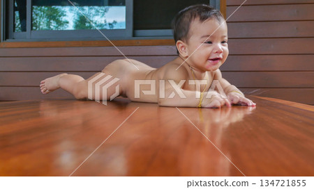 cute asian baby girl on table 134721855