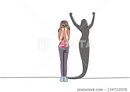 Single line drawing of woman cover her face in despair with triumphant shadow show raised arms behind. Rising from the ashes for a mental health. Resilience theme is National Posttraumatic Growth Day Single line drawing of woman cover her face in despair with triumphant shadow show raised arms behind. Rising from the ashes for a mental health. Resilience theme is National Posttraumatic Growth Day 134722078
