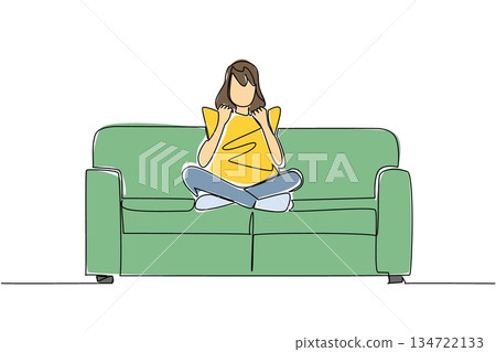 One line drawing of a woman sitting cross legged on a couch, holding and cuddling pillow to her chest, engrossed in a movie alone, symbolizing comfortable solitude and personal entertainment. One line drawing of a woman sitting cross legged on a couch, holding and cuddling pillow to her chest, engrossed in a movie alone, symbolizing comfortable solitude and personal entertainment. 134722133
