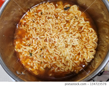 Shin Ramyun,close up of Ramyeon or Ramyun is a Korean-style soup noodle dish with a spicy flavor. Ramyeon or Korean instant noodles with egg - Korean food style Shin Ramyun,close up of Ramyeon or Ramyun is a Korean-style soup noodle dish with a spicy flavor. Ramyeon or Korean instant noodles with egg - Korean food style 134723578