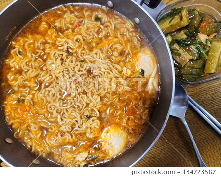 Shin Ramyun,close up of Ramyeon or Ramyun is a Korean-style soup noodle dish with a spicy flavor. Ramyeon or Korean instant noodles with egg - Korean food style Shin Ramyun,close up of Ramyeon or Ramyun is a Korean-style soup noodle dish with a spicy flavor. Ramyeon or Korean instant noodles with egg - Korean food style 134723587
