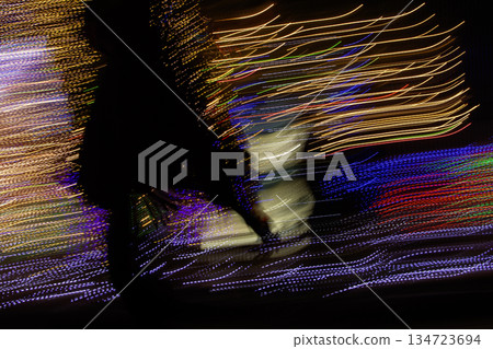 Illuminations and silhouette of a man Illuminations and silhouette of a man 134723694