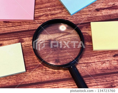 magnifying glass, magnifier, examining 134723760