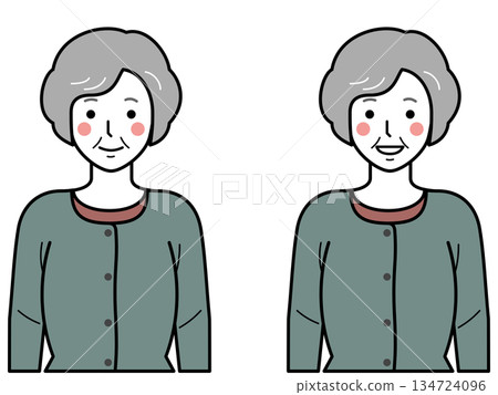 Front view. Elderly woman wearing a cardigan with her arms down. 134724096