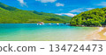 panoramic landscape with a white sandy beach and blue water in a bay of the sea on a tropical paradise island in Asian resort in summer 134724473