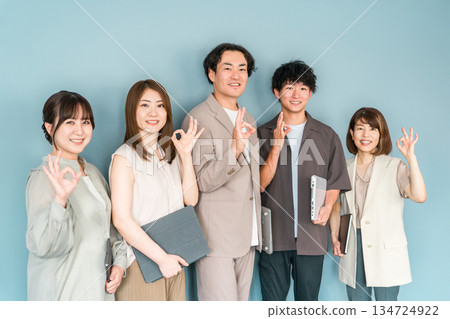 Male and female businessmen in company offices, office casual (ok, nice, good, success) Male and female businessmen in company offices, office casual (ok, nice, good, success) 134724922