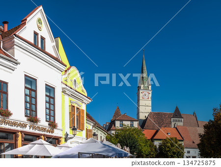 Historic Town Square With Colorful Buildings And Outdoor Cafes In Medias Historic Town Square With Colorful Buildings And Outdoor Cafes In Medias 134725875