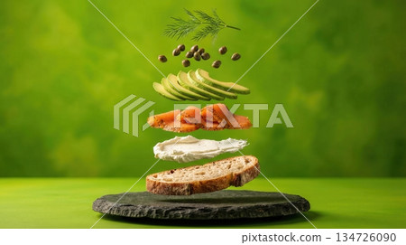 Deconstructed Salmon And Avocado Toast Ingredients green background 134726090