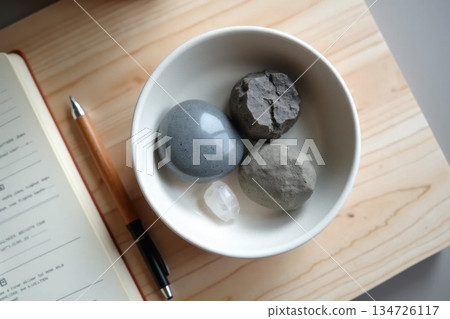 Crypto Storage Types as Natural Stones in Ceramic Bowl 134726117