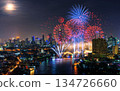 colorful fireworks with reflection on water 134726660