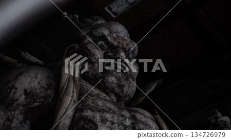 "A wooden Buddha statue standing in the darkness (Toyooka City, Hyogo Prefecture)" "A wooden Buddha statue standing in the darkness (Toyooka City, Hyogo Prefecture)" 134726979