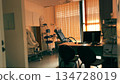 Gynecologist examination room interior with medical chair and equipment 134728019