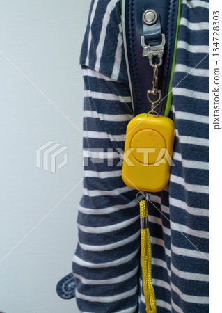 School bag with a security alarm and copy space School bag with a security alarm and copy space 134728303
