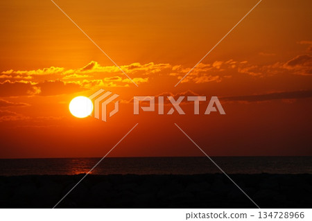 Golden dawn on the sea. 134728966