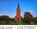 Brick Church and Cemetery at Sunset in Lillehammer, Norway 134729007