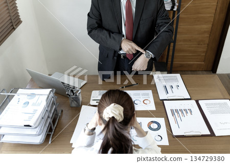 Manager showing dissatisfaction with subordinates late 134729380