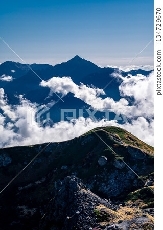Mount Tsurugi and the sea of clouds seen from the terrace of Hakuba Sanso (in front of Sky Plaza Hakuba) - Hiking Mount Hakuba in the Northern Alps 134729670
